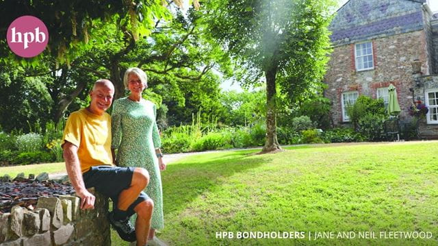 Couple Jane and Neil Fleetwood posing together at their HPB bond